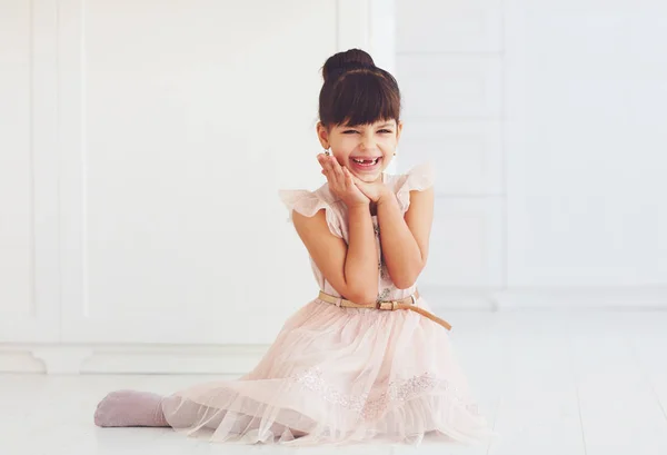 Portrait of beautiful delighted little lady with cute toothless smile — Stock Photo, Image