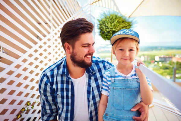 Portrait of happy father and son, family repairing rooftop patio zone of the house — Stock Photo, Image