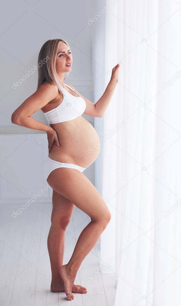 happy pregnant woman enjoying her new condition