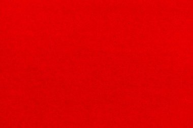 Kırmızı arka plan. Kadife kağıt dokusu.