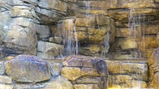 Waterfall flowing over the wall with large stones. — Stock Footage Waterfall flowing over the wall with large stones. Stock Video