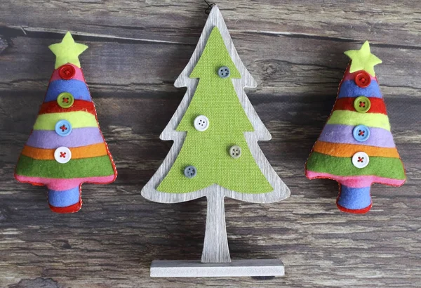 Original christmas tree on a wooden background — Stock Photo, Image