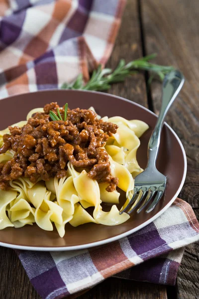 Pasta bolognese, pasta with meat and tomato sauce