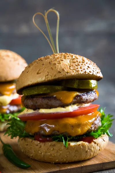 Big hamburger on table — Stock Photo, Image