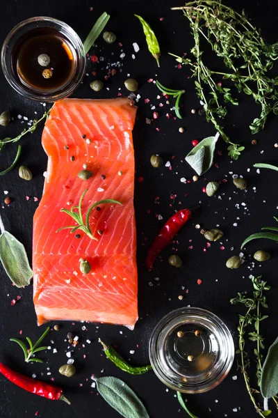 Salmon with spices and herbs — Stock Photo, Image