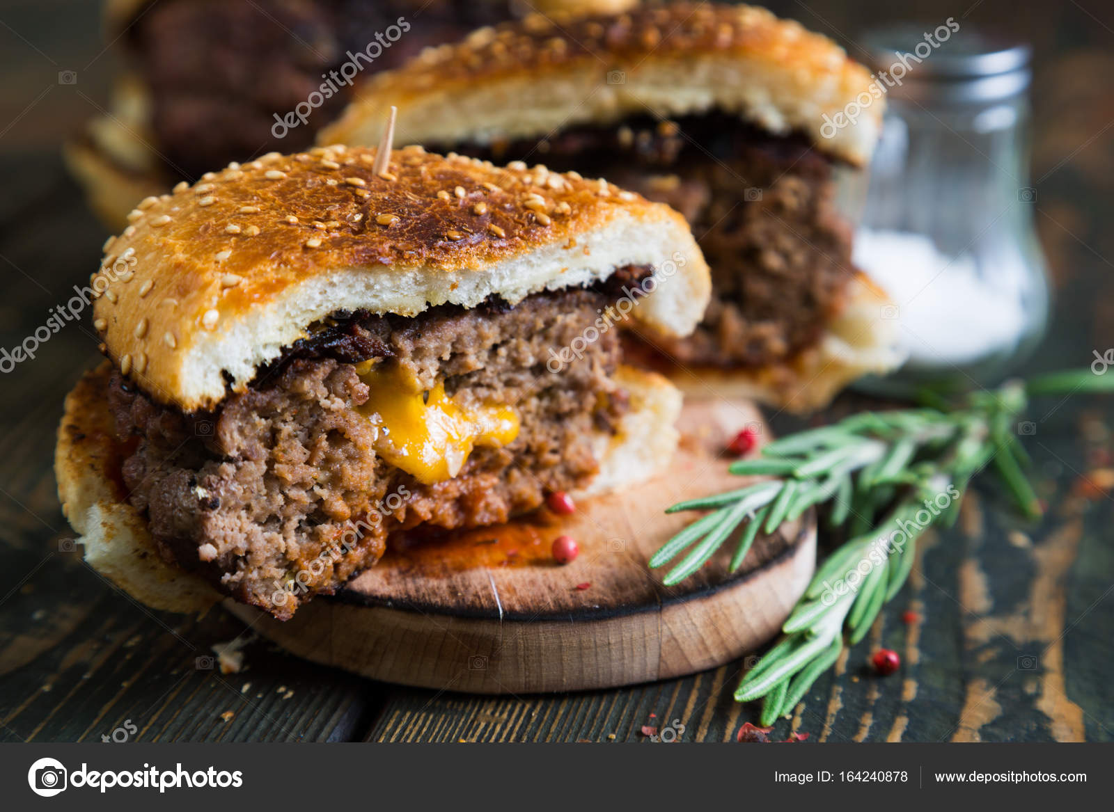 Big burger with cheddar cheese Stock Photo by ©rus7 164240878