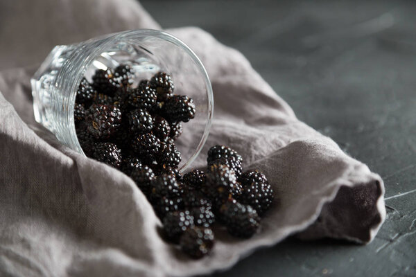 Fresh blackberries in glass