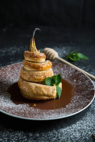 Baked pear in puff pastry