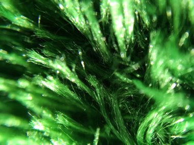 Tüylü kıvılcım kumaşından arkaplan ya da doku. Makro. Yumuşak malzeme. Tekstil.