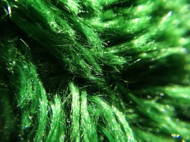 Tüylü kıvılcım kumaşından arkaplan ya da doku. Makro. Yumuşak malzeme. Tekstil.