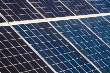 Elektro plakaların arka planı ya da dokusu, eve yerleştirilmiş güneş panelleri. Modern elektrik kaynağı.