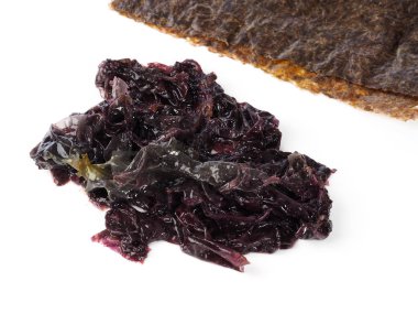 Nori deniz yosunu Alga Noriedible yosun kırmızı alg. Binominal adı: Porphyra Umbilicalis. Bu kurutulmuş yaprak suşi sarmak için kullanılır.