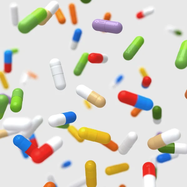 Falling colorful pills - 3D illustration — Stock Photo, Image