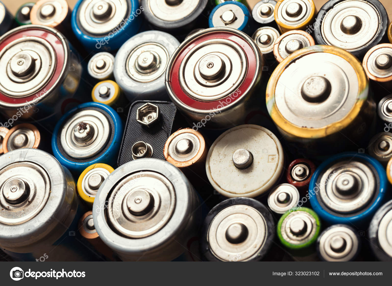 Used Alkaline batteries toxic waste recycling and ecology issues Stock Photo by ©dnaumoid 323023102