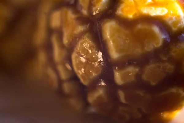 Closeup of popcorn in caramel. Popcorn with brown caramel in the cracks