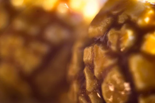 Closeup of popcorn in caramel. Popcorn with brown caramel in the cracks