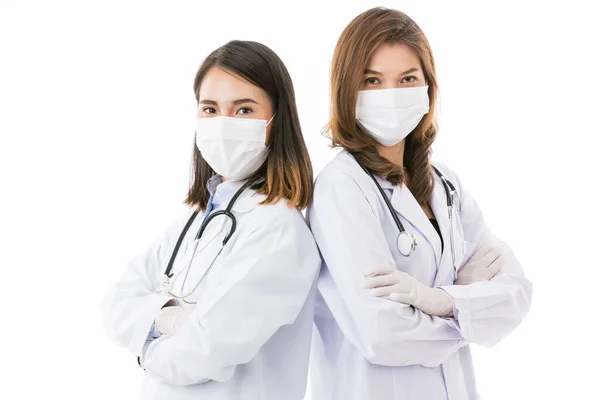 Två Kvinnliga Läkare Bär Kirurgisk Skyddshygien Mask Stående Tillsammans Isolerad — Stockfoto