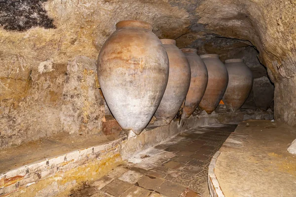 These old stone vases in the caves below Requena were used for the storage of wine, Spain