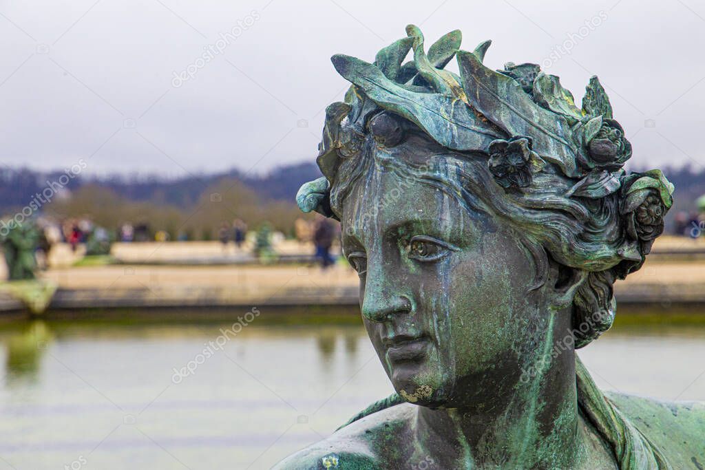 Parts of ancient and historical style bronze statue in the park