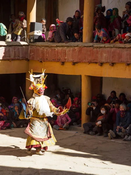 Unidentified monk in deer mask with sword performs religious mystery dance of Tibetan Buddhism during the Cham Dance Festival — Stock Photo, Image