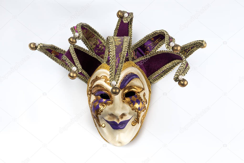 A classical venetian mask made from papier mache with dark eyes