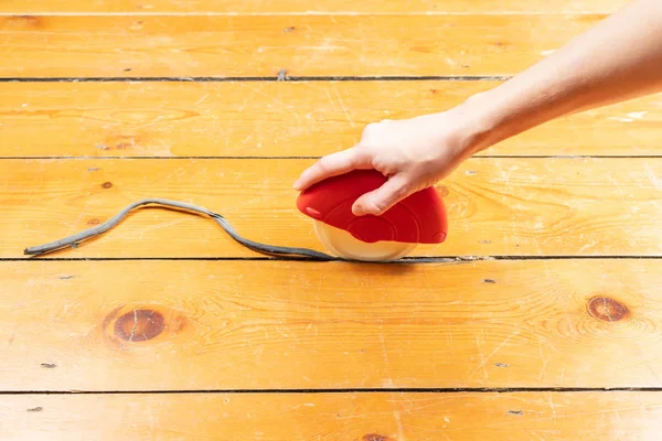 How to Fill Gaps in Floorboards and Seal Floorboards to Prevent Draughts and Heat Loss. Best way to draught-proof stripped wooden floors. Using the Applicator