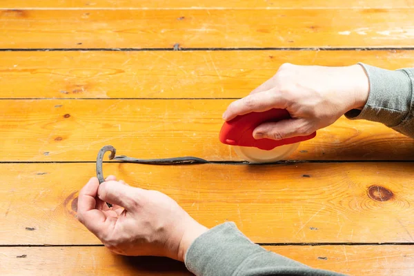 How to Fill Gaps in Floorboards and Seal Floorboards to Prevent Draughts and Heat Loss. Best way to draught-proof stripped wooden floors. Using the Applicator