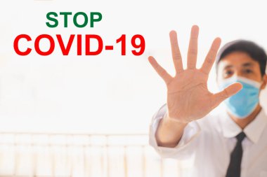 Covid 19 virüsünü durdurmak için insan denetimi ya da insan ticareti. Covid 19 ya da Corona korunması sosyal mesafeli dünya için koruma sağlar ve insanlar virüs uyarısını durdurur.