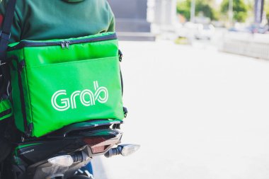 CHONBURI MARCH Bu Gıda Kutusu Yeşil Yemek. Bu yüzden Motosiklet Park 'a yiyecek teslimatı için başvuru için bekleyen müşterileri bekliyor. Yaşam Tarzları İnternet hizmetleri evden online iş satın alıyor.