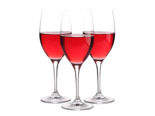 Three wineglasses with some wine isolated on white — Stock Photo, Image