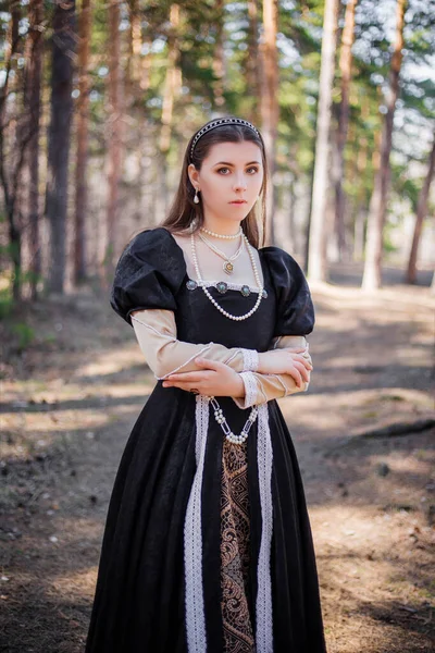 Portrait Young Beautiful Woman Black Medieval Dress Standing Pine Forest — Stock Photo, Image