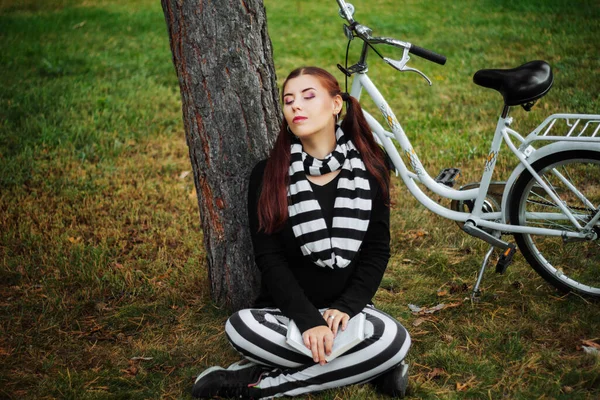 Young Woman Park Sits Lawn Leaning Tree Book Her Hands Stock Photo