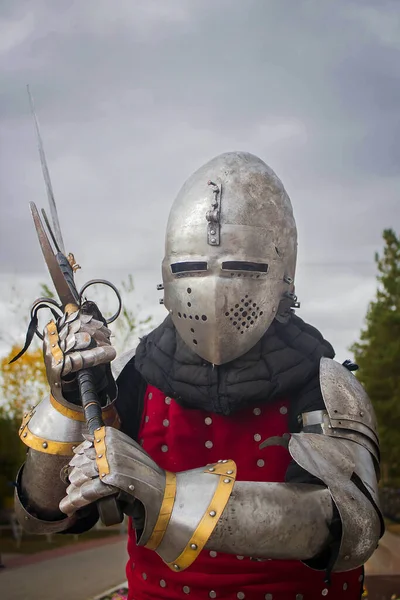 Knight Helmet Red Brigantine Background Thunderclouds Two Handed Sword His — Stock Photo, Image
