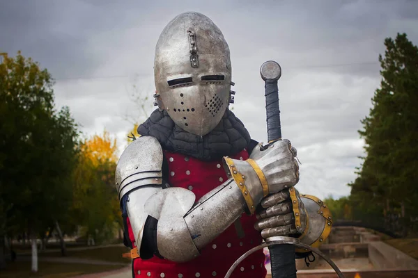 Knight Helmet Red Brigantine Background Thunderclouds Two Handed Sword His — Stock Photo, Image