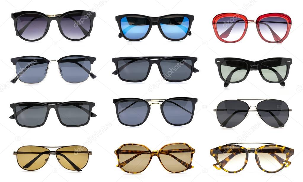 Group of beautiful sunglasses isolated on white background. Cost