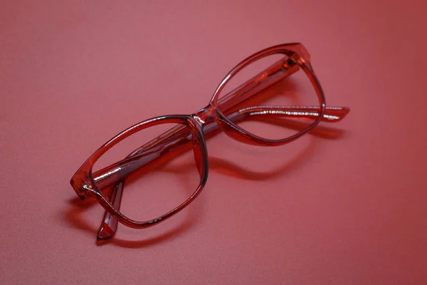Bild Der Modernen Modischen Brille Isoliert Auf Rotem Hintergrund Brille — Stockfoto