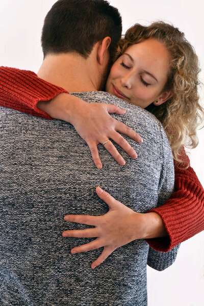 couple in warm sweaters 