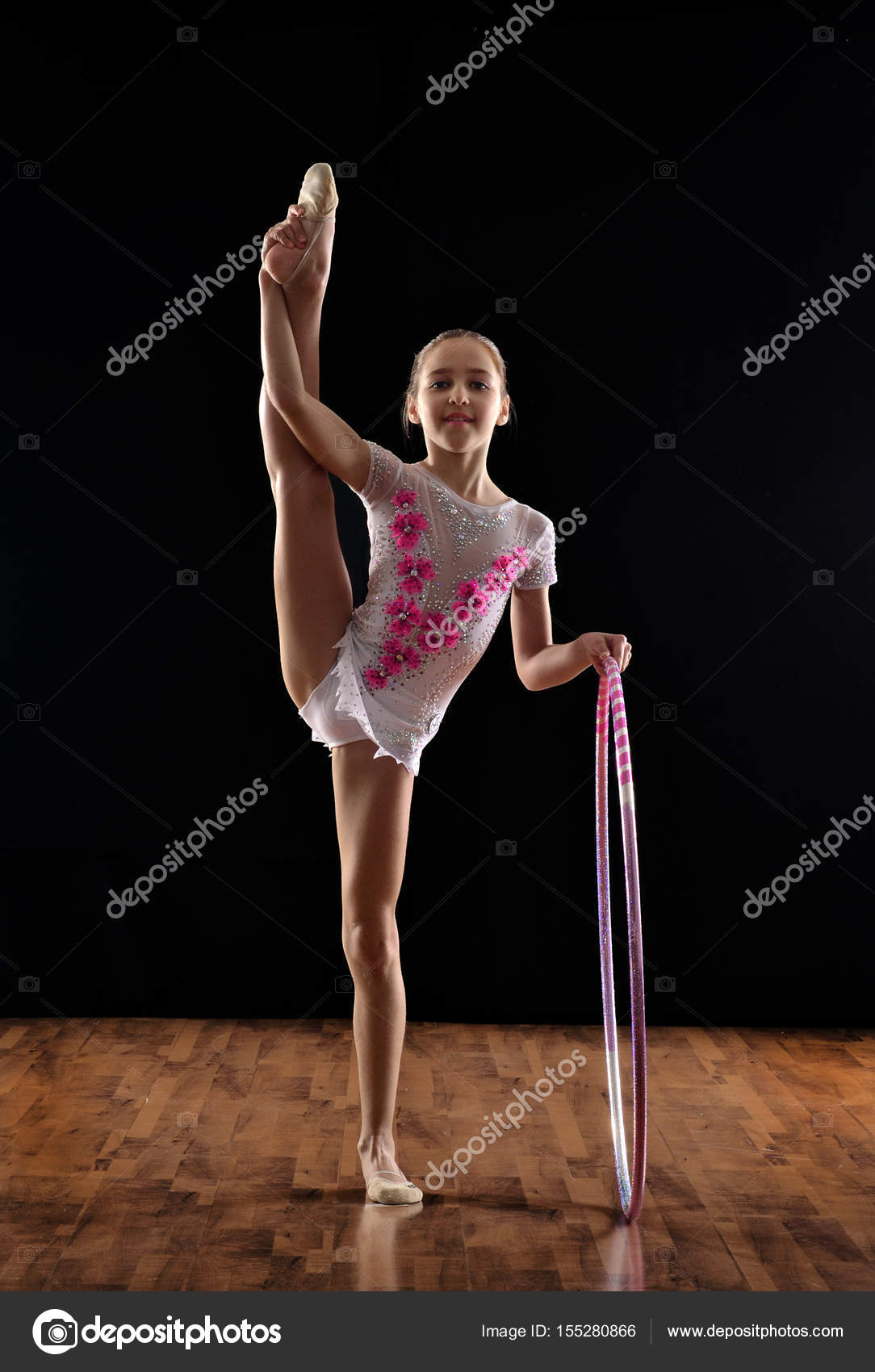 Rhythmic gymnastic girl and ring Stock Photo by ©Gustavo_Andrade 155280866