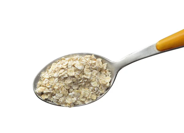 Dry oatmeal in spoon — Stock Photo, Image