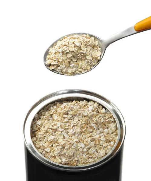 Dry oatmeal in spoon — Stock Photo, Image