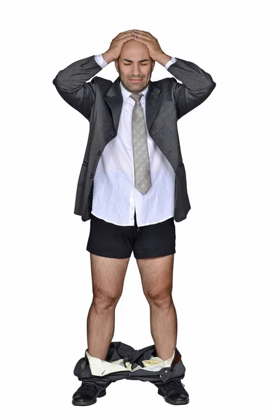 Podnikatel s kalhotami dole — Stock fotografie