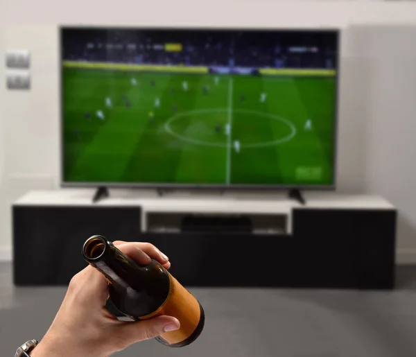 Man Watching Football Drinking Beer — Stock Photo, Image