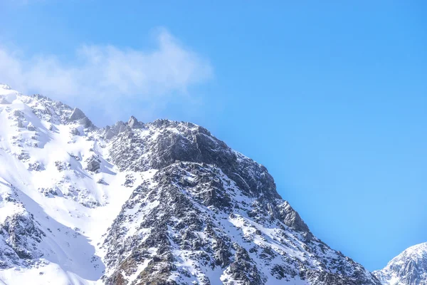 Topp Berg Med Blå Himmel Stockbild