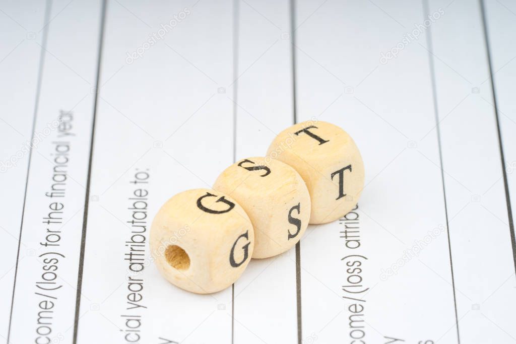 Wooden letter cube with financial concept
