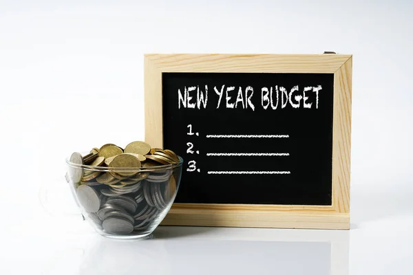 Coins Cup Glass Blackboard White Text New Years Concept — Stock Photo, Image