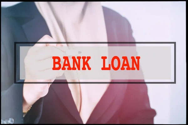 Hand and text BANK LOAN with vintage background. Technology concept.