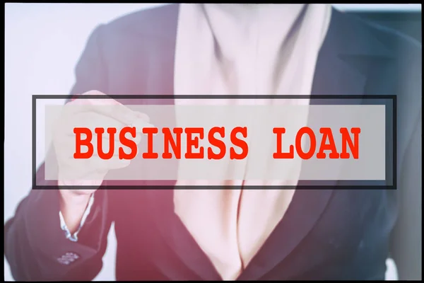 Hand and text  BUSINESS LOAN with vintage background. Technology concept.