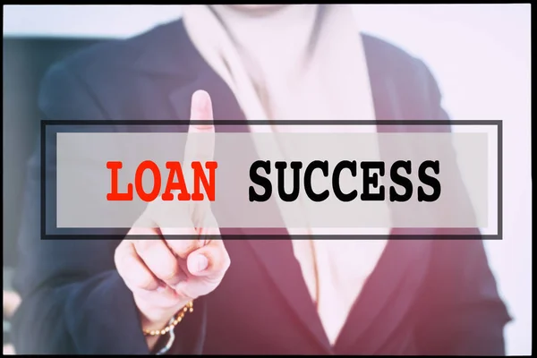 Hand and text LOAN SUCCESS with vintage background. Technology concept.