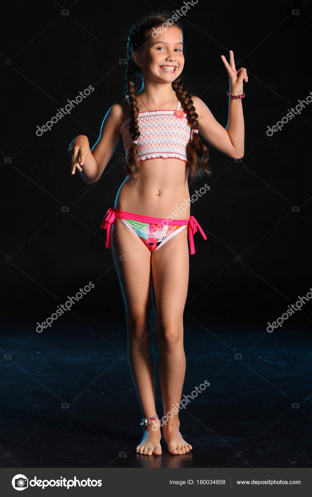 Happy Young Teenage Girl Swimsuit Stands Barefoot Black Background