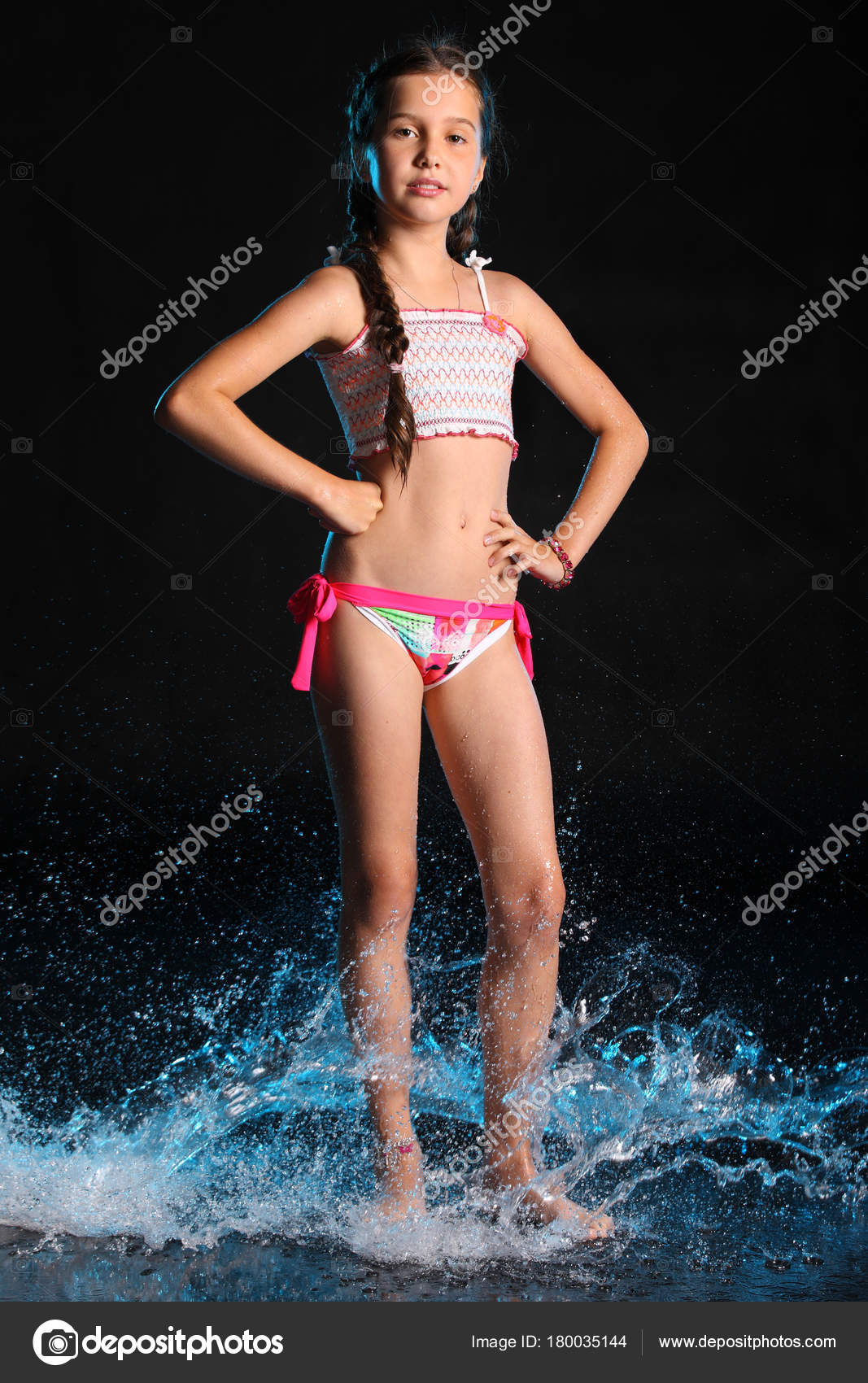 Adorable Young Teenage Girl Swimsuit Stands Barefoot Splashing